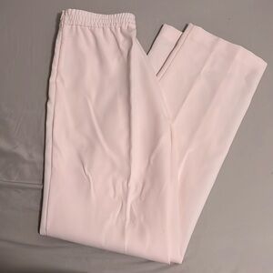 Light pink dress pants from Mango. Never worn. Perfect condition with tags on